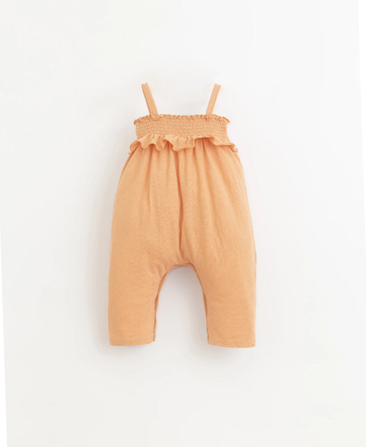 Jumpsuit with elastic chest